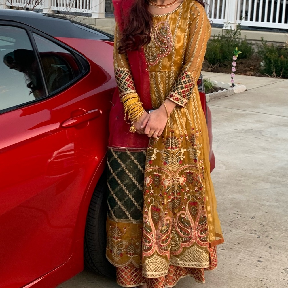 2 piece frock; yellow colors throughout with a lot of detailing